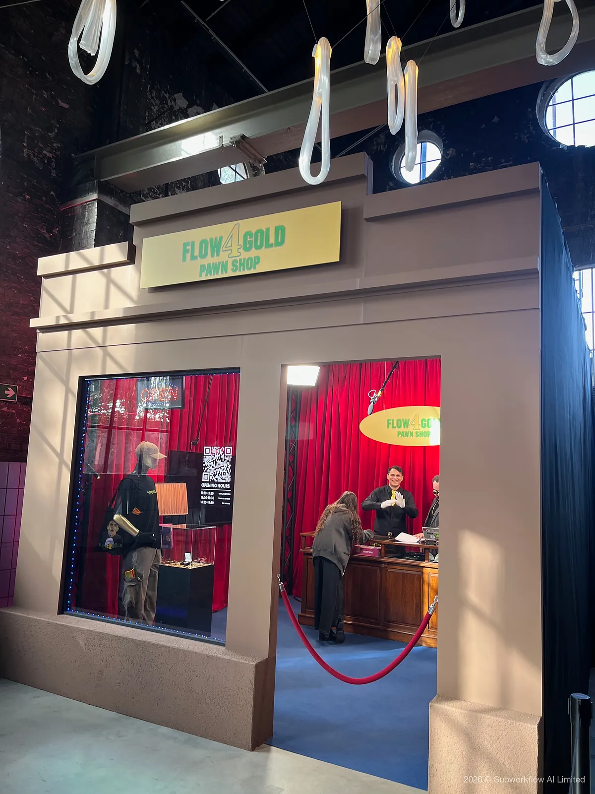 The Flow4Gold Pawn Shop, a mock shopfront stand in the hall