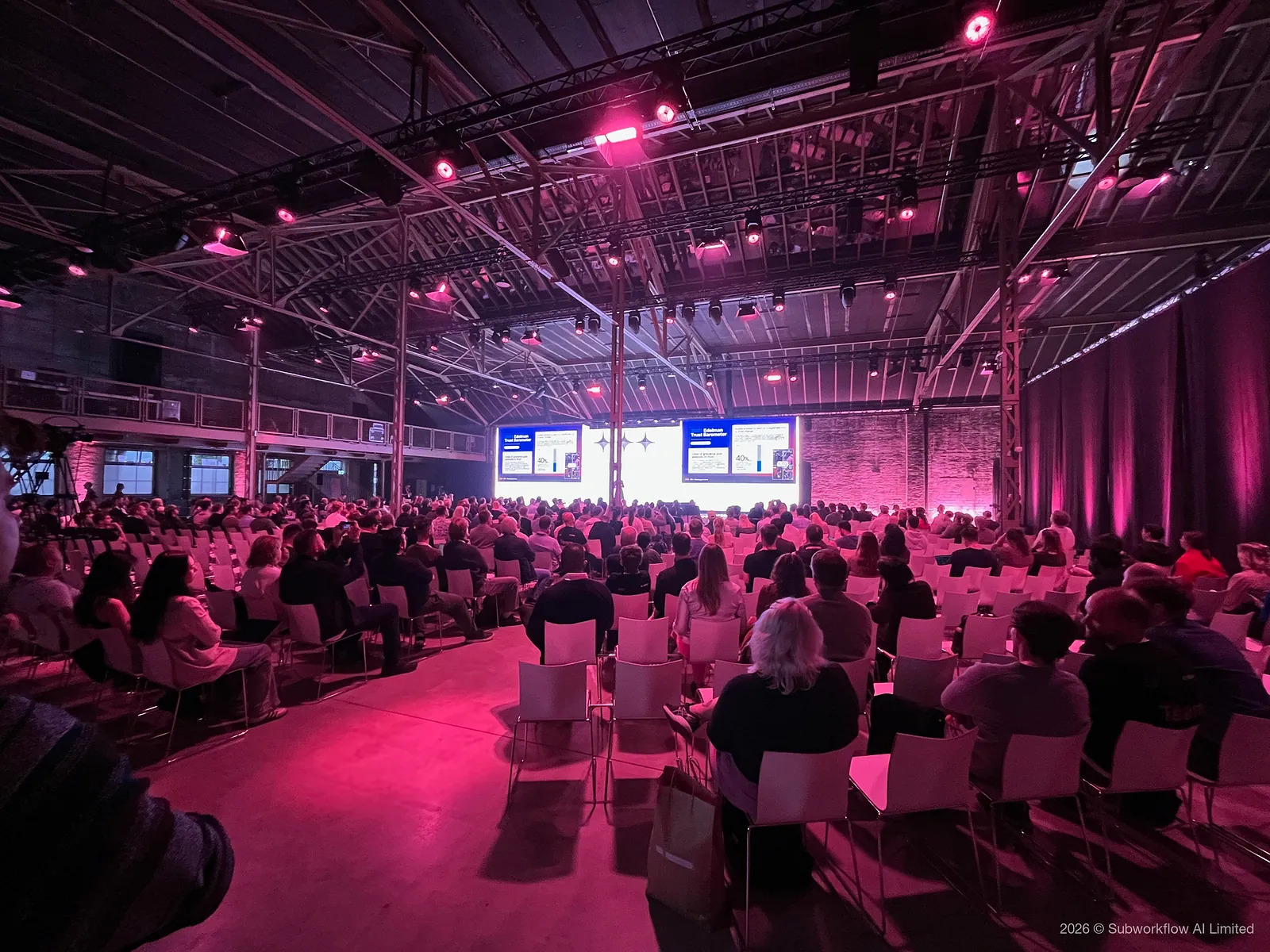 The packed main hall from the back during a keynote