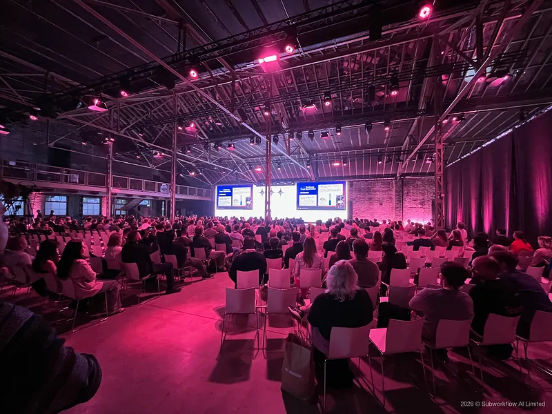 The packed main hall from the back during a keynote